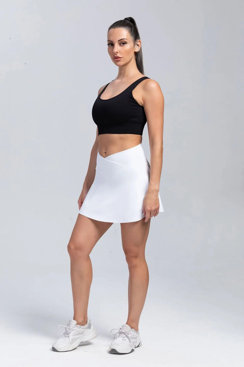 Faldas transpirables con pantalones cortos fitness